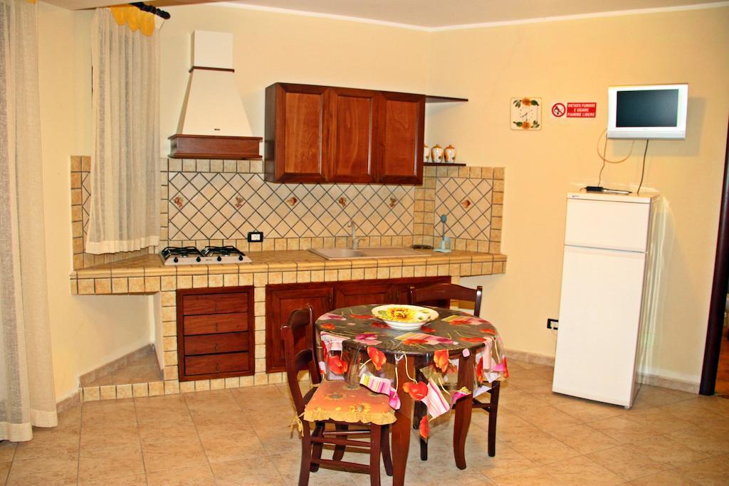 Puesta De Sol Residence LMP Habitación foto